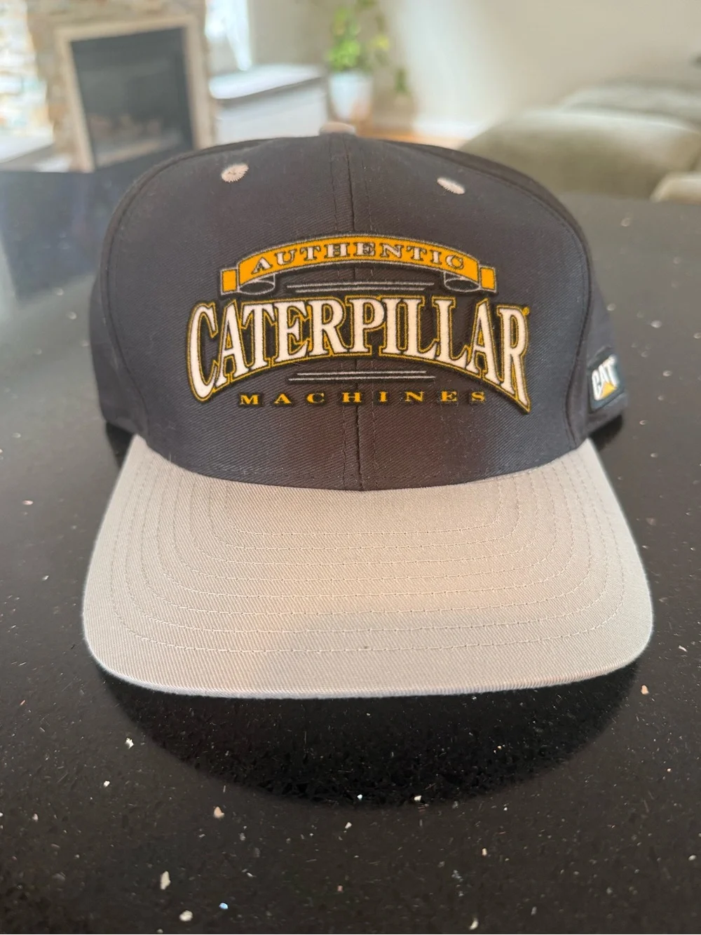 Authentic Caterpillar Black and Gray Authentic Machines Snapback Cap